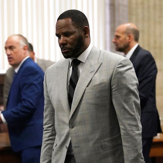 R Kelly Suing