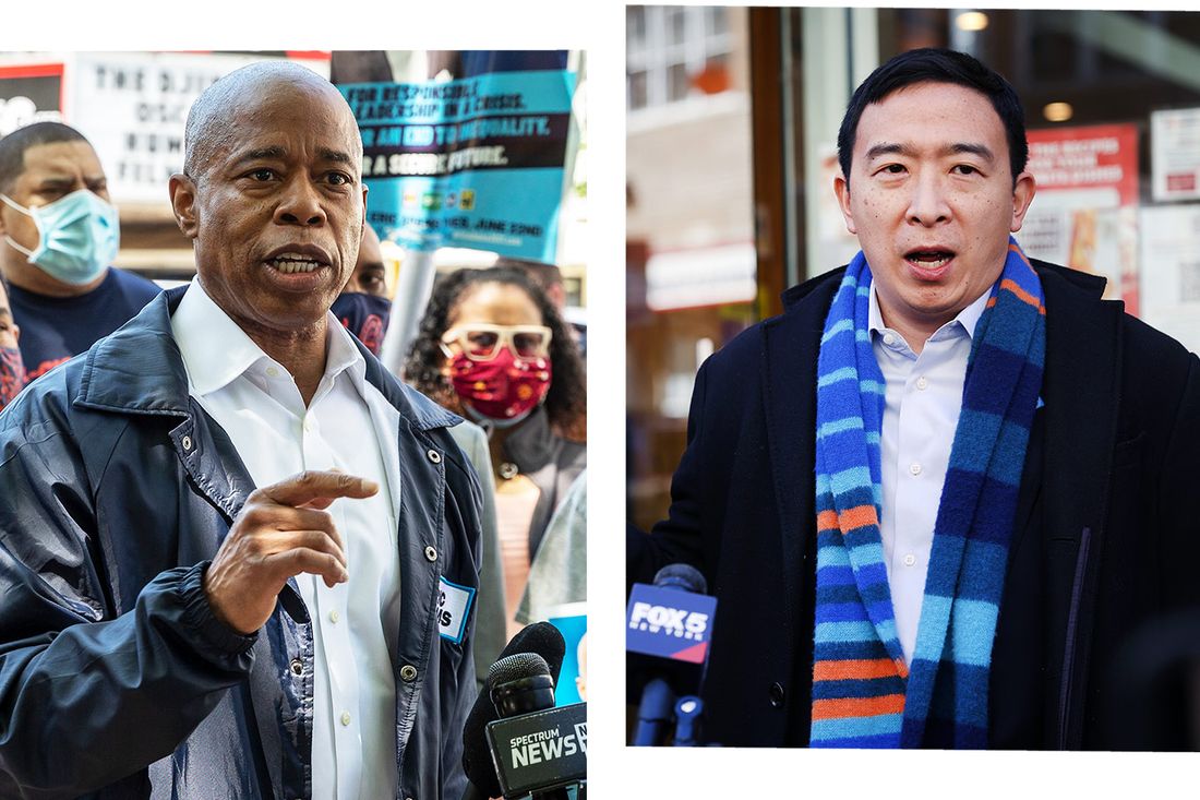 Eric Adams speaking on left to a crowd, Andrew Yang on the right