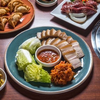 Bossam, meats for grilling, fried dumplings, kimchi — what more could you ask for?