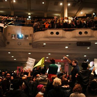 Demonstrators attend a Panel for Educational Policy meeting at Brooklyn Tech High School before they vote on whether to close or partially close 23 schools that the Department of Education considers failing on February 9, 2012 in New York City. Members of Occupy Wall Street joined teachers, parents and concerned residents to protest against the proposed closings. Critics say Mayor Michael Bloomberg should be fixing the city's schools, not closing them. 