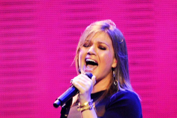 LAS VEGAS, NV - SEPTEMBER 23:  Singer Kelly Clarkson performs onstage at the iHeartRadio Music Festival held at the MGM Grand Garden Arena on September 23, 2011 in Las Vegas, Nevada.  (Photo by Ethan Miller/Getty Images for Clear Channel)