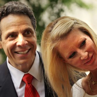 NEW YORK - MAY 22: New York Attorney General Andrew Cuomo stands on stage in the park with his girlfriend, Food Network host Sandra Lee, following his announcement to supporters that he is officially running for the Governor of New York outside the Tweed Courthouse on May 22, 2010 in New York City. For eleven years Cuomo's father, Mario, was the fifty-second Governor of the state. (Photo by Spencer Platt/Getty Images)