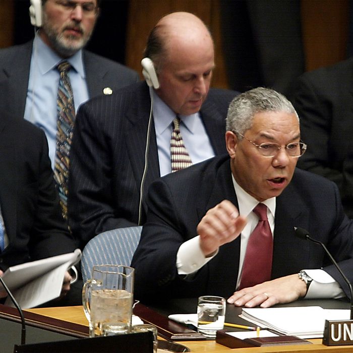 U.S. Secretary of State Colin Powell gestures during his address to the UN Security Council February 5, 2003 in New York City. Powell is making a presentation attempting to convince the world that Iraq is deliberately hiding weapons of mass destruction.