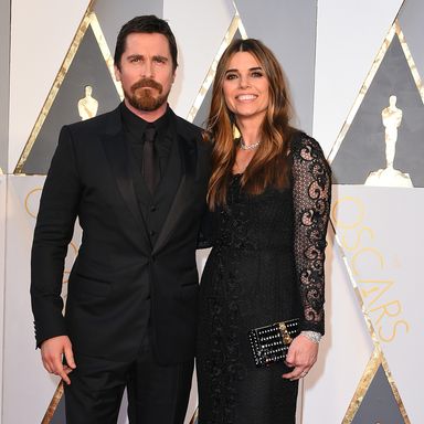 Christian Bale and Sibi Blazic 
Suit by Dolce & Gabbana.