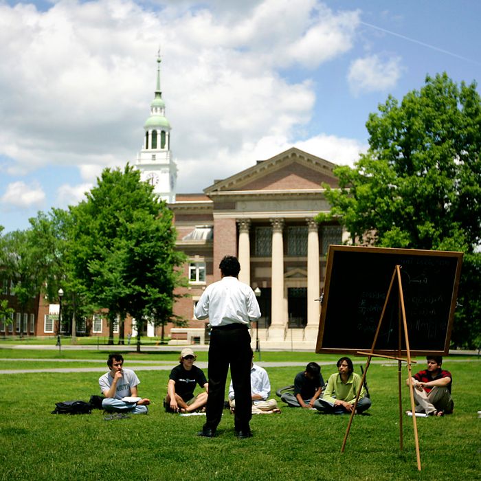 UNITED STATES - JUNE 02: A group of students meet on the lawn outside Webster Hall on the campus of Dartmouth College, the smallest school in the Ivy League, in Hanover, New Hampshire, U.S., on Tuesday, June 2, 2009. Dartmouth, whose endowment was valued at $3.7 billion as of June 30, likely lost about 23 percent from that point through the end of March, Moody's Investors Service said May 27. (Photo by Cheryl Senter/Bloomberg via Getty Images)