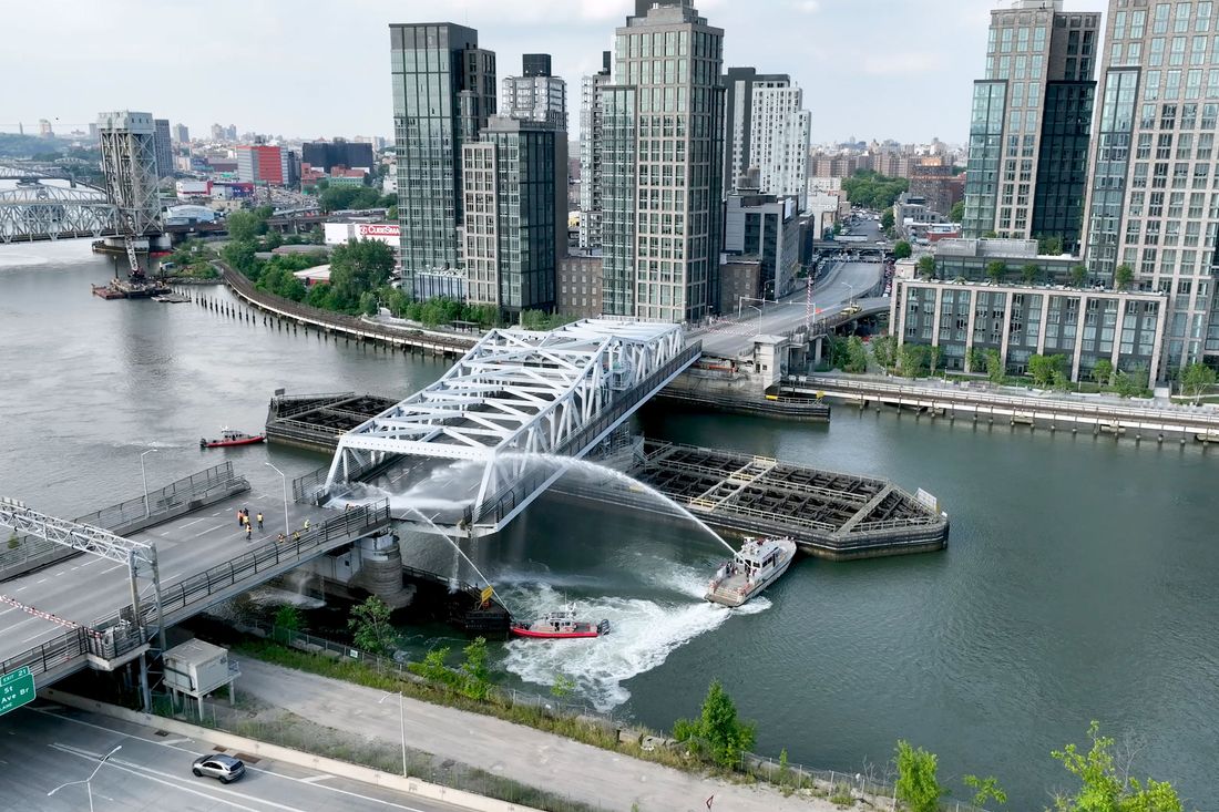 The FDNY fireboats Bravest and William M. Feehan douse the Third Avenue Bridge to get it closed on July 8.