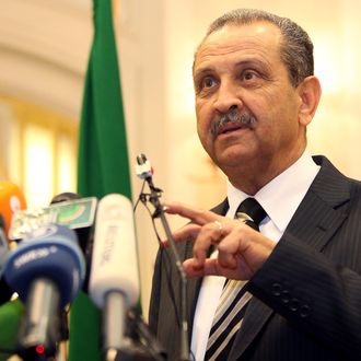 Libyan Oil Minister Shukri Ghanem speaks during a press conference in Tripoli on March 19, 2011 to announce that Libya's National Oil Corp will honour its contracts with foreign firms operating in the country. AFP PHOTO/MAHMUD TURKIA (Photo credit should read MAHMUD TURKIA/AFP/Getty Images)