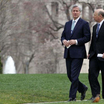 WASHINGTON - MARCH 27: Jamie Dimon (L) CEO and chairman of JPMorgan Chase & Co, and Lloyd Craig Blankfein, CEO of The Goldman Sachs Group, Inc. walk away from the White House after a meeting with U.S. President Barack Obama at the White House March 27, 2009 in Washington, DC. Obama used the meeting to tell the bankers that they must look beyond short-term interests toward obligations each person has in order to make it through the current economic troubles. (Photo by Mark Wilson/Getty Images) *** Local Caption *** Lloyd Craig Blankfein;Jamie Dimon