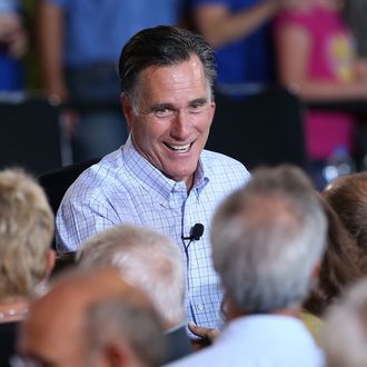 BASALT, CO - AUGUST 02: Republican presidential candidate and former Massachusetts Gov. Mitt Romney greets supporters during a campaign event with Republican Governors at Basalt Public High School on August 2, 2012 in Basalt, Colorado. One day after returning from a six-day overseas trip to England, Israel and Poland, Mitt Romney is campaigning in Colorado before heading to Nevada. (Photo by Justin Sullivan/Getty Images)