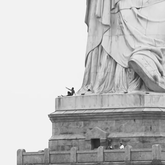 Woman Climbs Statue Of Liberty Over Trump Immigration Policy