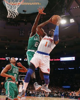 Amar'e Stoudemire #1 of the New York Knicks takes the shot against the Boston Celtics at Madison Square Garden on January 7, 2013 in New York City.