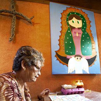 Sylvia Quintero, an astrologist and Tarot card reader, shares her visions on politics and the future from her home in a special room for card reading on June 16, 2012, in Cabo San Lucas, BCS, Mexico