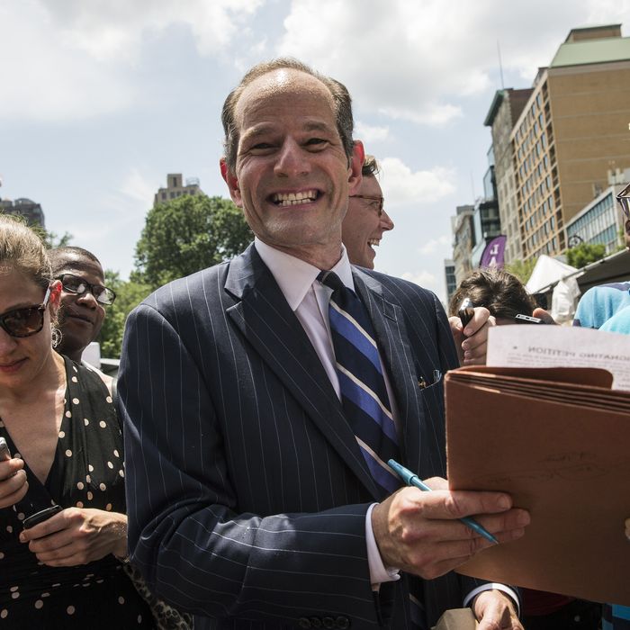 NEW YORK, NY - JULY 08: Former New York Gov. Eliot Spitzer collects signatures from citizens to run for comptroller of New York City on July 8, 2013 in New York City. Spitzer resigned as governor in 2008 after it was discovered that he was using a high end call girl service. (Photo by Andrew Burton/Getty Images)