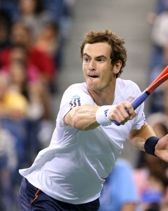 Andy Murray of Great Britain plays a backhand in his men's singles fourth round match against Milos Raonic of Canada during Day Eight of the 2012 US Open at USTA Billie Jean King National Tennis Center on September 3, 2012 in the Flushing neighborhood of the Queens borough of New York City. 