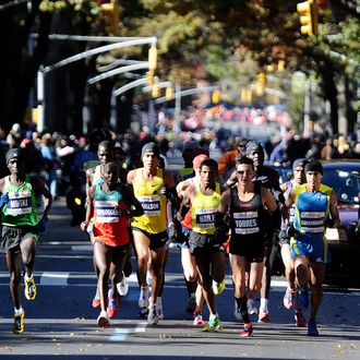 Elite men runners compete in the New York City Marathon in New York on November 7, 2010. Ethiopian Gebre Gebremariam won in a time of 2:08.14 ahead of Kenyans Emmanuel Mutai and Moses Kigen Kipkosgei. World record holder Haile Gebrselassie (C) announced his retirement after dropping out of the race. AFP PHOTO/Emmanuel Dunand (Photo credit should read EMMANUEL DUNAND/AFP/Getty Images)