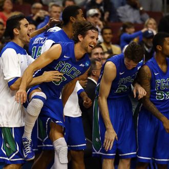 PHILADELPHIA, PA - MARCH 24: Christophe Varidel #5 of the Florida Gulf Coast Eagles celebrates on the bench late in the second half while taking on the San Diego State Aztecs during the third round of the 2013 NCAA Men's Basketball Tournament at Wells Fargo Center on March 24, 2013 in Philadelphia, Pennsylvania. (Photo by Elsa/Getty Images)