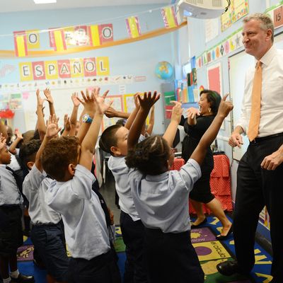 NEW YORK, NY - SEPTEMBER 4: New York Mayor Bill de Blasio visits a second grade Spanish class at Amber Charter School in Manhattan on the first day of NYC public schools, September 4, 2014 in New York City. New York Mayor Bill de Blasio is touring universal pre-kindergarten programs throughout the city. (Photo by Susan Watts-Pool/Getty Images)