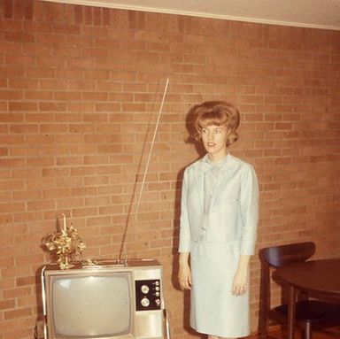 A selection from Oliver Wasow's photo essay "Go Over There By the TV" (2014).