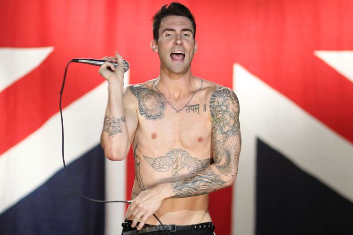 Adam Levine debuts new rose face tattoo