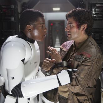 Star Wars: The Force AwakensL to R: Finn (John Boyega) and Poe Dameron (Oscar Isaac)Ph: David James© 2015 Lucasfilm Ltd. & TM. All Right Reserved.