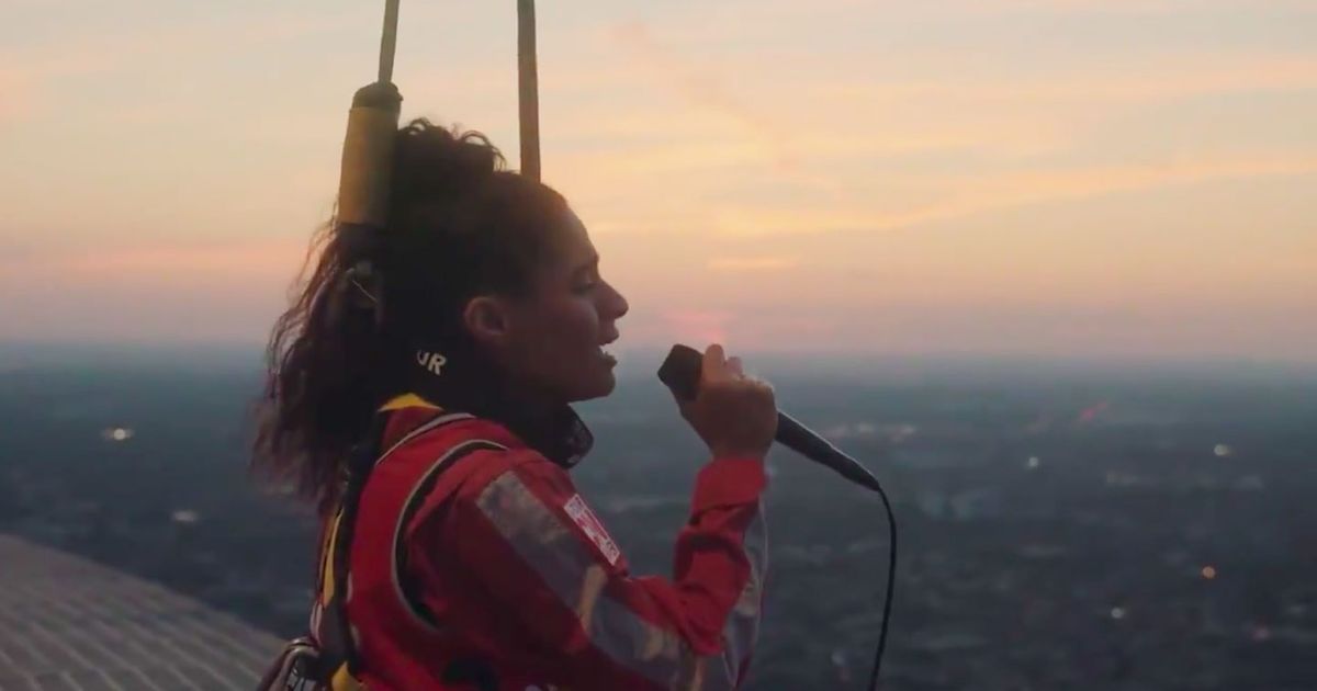 Jessie Reyez Sings O Canada From Atop The Cn Tower