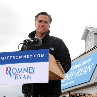 VAN METER, IOWA - OCTOBER 9: U.S. Republican presidential candidate, former Massachusetts Gov. Mitt Romney speaks to supporters at a rally on a farm on October 9, 2012 near Van Meter, Iowa. Romney is campaigning in Iowa with four weeks to go before the general election. (Photo by Steve Pope/Getty Images)