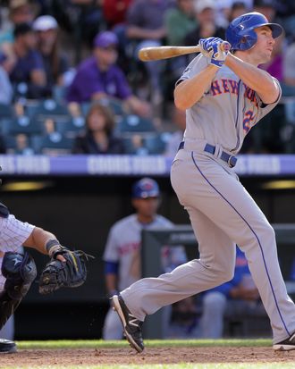 Mike Baxter #23 of the New York Mets pinch hits for a base hit against the Colorado Rockies in the 10th inning at Coors Field on April 29, 2012. 