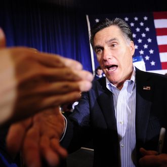 Republican presidential hopeful Mitt Romney greets supporters during a campaign rally in Reno, Nevada, February 2, 2012. AFP PHOTO/Emmanuel Dunand (Photo credit should read EMMANUEL DUNAND/AFP/Getty Images)