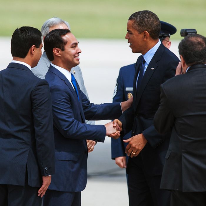 President Barack Obama is greeted by San Antonio Mayor Julian Castro upon his arrival Tuesday, July 17, 2012 in San Antonio. (AP Photo/Bahram Mark Sobhani)