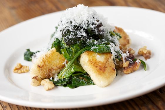 Goat-cheese-ricotta-semolina Malfatti with Black Kale and Walnuts
Bar Bambino, San Francisco
2931 16th Street
415.701.8466; $16
At one point they were calling them topfenknodel, which is what they'd be called in parts of Friuli and Tyrol, and to avoid customer confusion they changed the menu description to say 