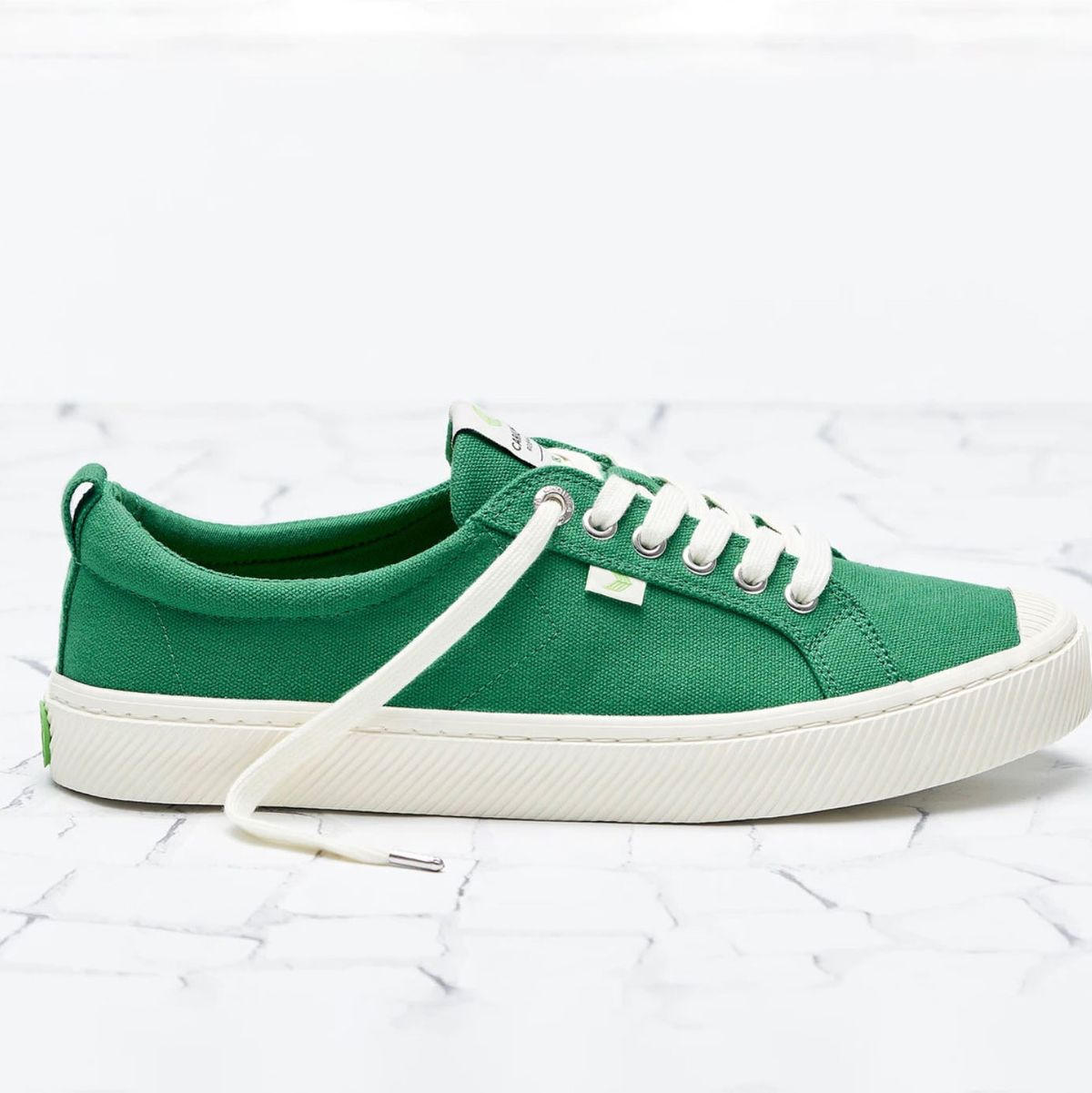 green colour sports shoes