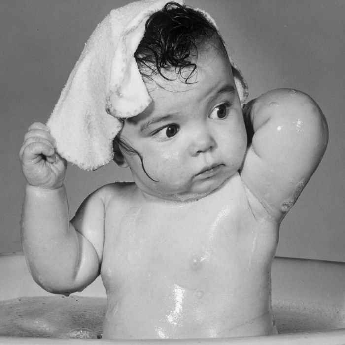 wash baby face with soap