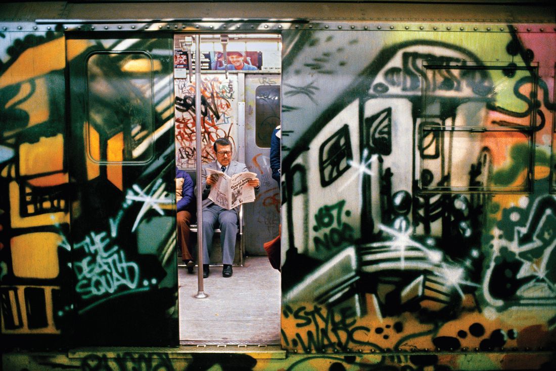 A very tall woman and a very short woman walk side by side at night in New  York City Stock Photo - Alamy