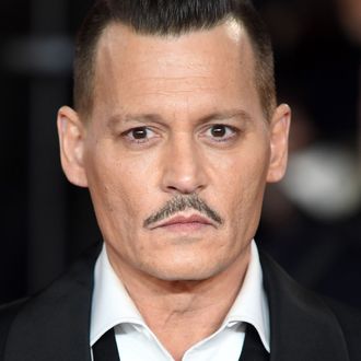 Johnny Depp Defends Acting With An Earpiece