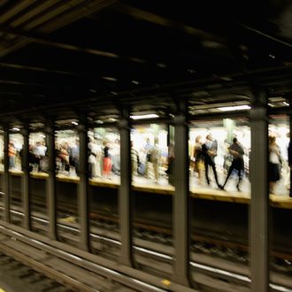 Manhattan, New York City, New York State, USA --- Commuters Waiting for Subway.