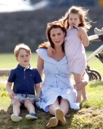 Prince George, Kate Middleton, and Princess Charlotte.