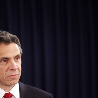 NEW YORK - NOVEMBER 09: New York Governor-elect Andrew Cuomo looks on at a press conference with current New York Governor David Paterson November 9, 2010 in New York City. Cuomo spoke about looming budget cuts, taxes and the state of the economy. (Photo by Mario Tama/Getty Images) *** Local Caption *** Andrew Cuomo