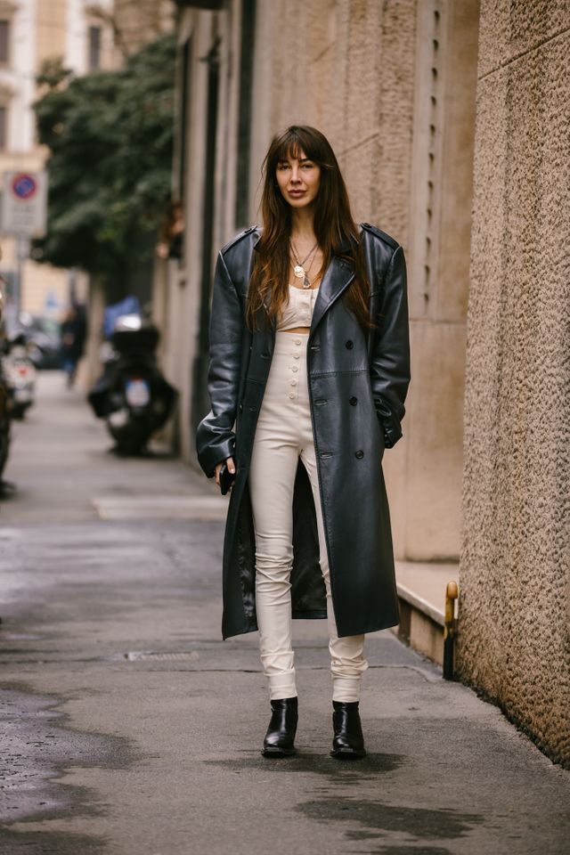 Woman with pink fur coat and brown Louis Vuitton bag before John Richmond  fashion show, Milan Fashion Week street style – Stock Editorial Photo ©  AndreaA. #272372864