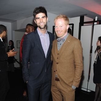 NEW YORK, NY - NOVEMBER 21: Jesse Tyler Ferguson (R) and Justin Mikita attends the Barneys New York Celebration Launch of Gaga's Workshop at Barneys New York on November 21, 2011 in New York City. (Photo by Jamie McCarthy/Getty Images for Barneys New York)