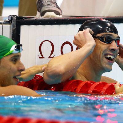 Michael Phelps of the United States celebrates winning the Mens 100m Butterfly Final on Day 7 of the London 2012 Olympic Games at the Aquatics Centre on August 3, 2012 in London, England.