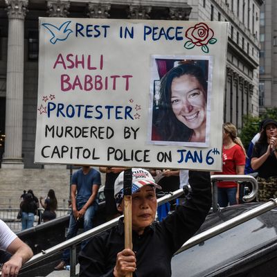 Protester with an Ashli Babbitt poster.