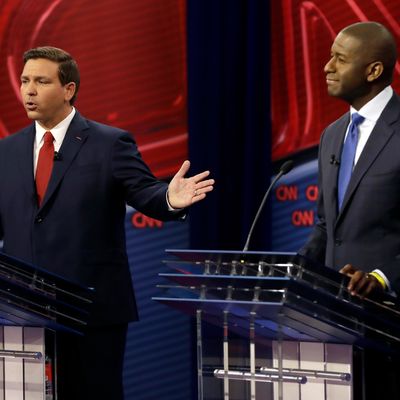 Florida Republican gubernatorial candidate Ron DeSantis, left, speaks about his Democratic opponent Andrew Gillum during a CNN debate, Sunday, Oct. 21, 2018, in Tampa, Florida.