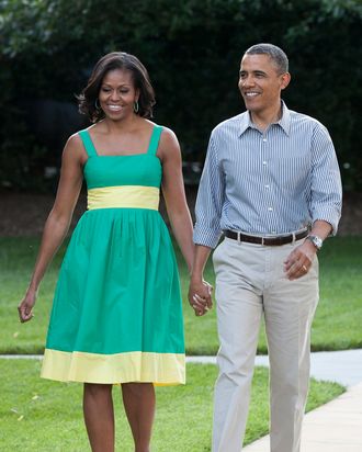 U.S. President Barack Obama and first lady Michelle Obama walk to the South Lawn of the White House on June 27, 2012 in Washington, D.D. The annual picnic was held for members of Congress.