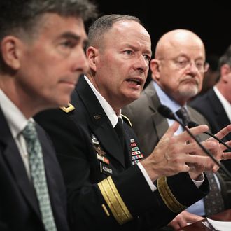 WASHINGTON, DC - OCTOBER 29: (L-R) Deputy Director of the National Security Agency Chris Inglis, Director of the National Security Agency Gen. Keith Alexander, Director of National Intelligence James Clapper, and Deputy Attorney General James Cole testify during a hearing before the House (Select) Intelligence Committee October 29, 2013 on Capitol Hill in Washington, DC. The committee held a hearing on 