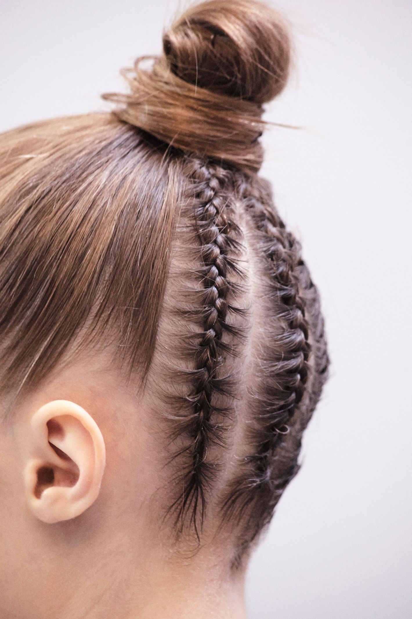 Dior’s Spring 2017 Show Had Girl-Power Makeup, Topknots