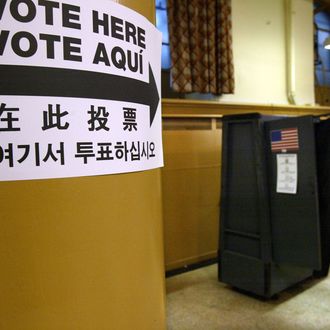  A woman leaves a voting booth on Election Day November 4, 2003 in New York City.