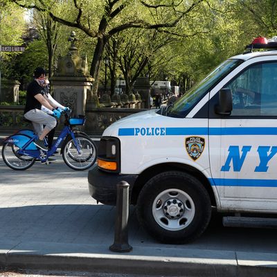 NYPD van and cyclist.