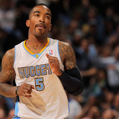 J.R. Smith #5 of the Denver Nuggets celebrates a three point shot against the Oklahoma City Thunder in Game Three of the Western Conference Quarterfinals in the 2011 NBA Playoffs on April 23, 2011 at the Pepsi Center in Denver, Colorado.