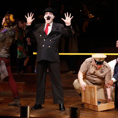 Ephraim Birney, Taylor Mac, Darryl Winslow, and Clifton Duncan in The Foundry Theatre's production of Good Person of Szechwan, with a translation by John Willett and directed by Lear deBessonet, running at The Public Theater at Astor Place