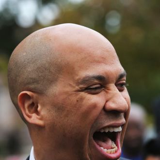 Newark Mayor Cory Booker speaks to reporters before casting his vote in a special U.S. Senate election on October 16, 2013 in Newark, New Jersey. Booker, a Democrat held a wide lead in the polls over Republican Tea Party candidate Steve Lonegan ahead of Wednesday's vote to succeed Frank Lautenberg, who died in office. 